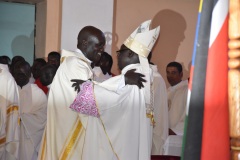 Archbishop-His-Grace-Stephen-Ameyu-Mulla-sharing-a-light-moment-with-the-priests-after-being-installed-as-the-Archbishop-of-Catholic-Diocese-of-Juba